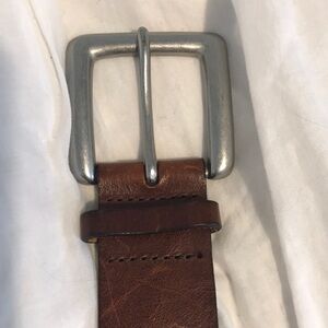 Beautiful brown leather belt with solid brass belt buckle